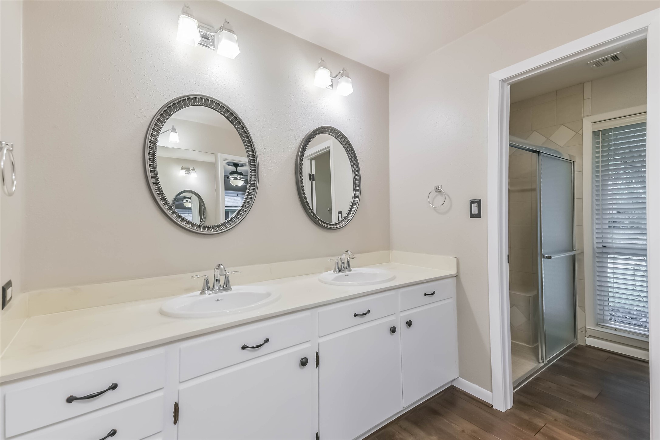 1210 Timber Lane Rosenberg, TX 77471 - Photo 24 of 48 a bathroom with a double vanity sink and a mirror