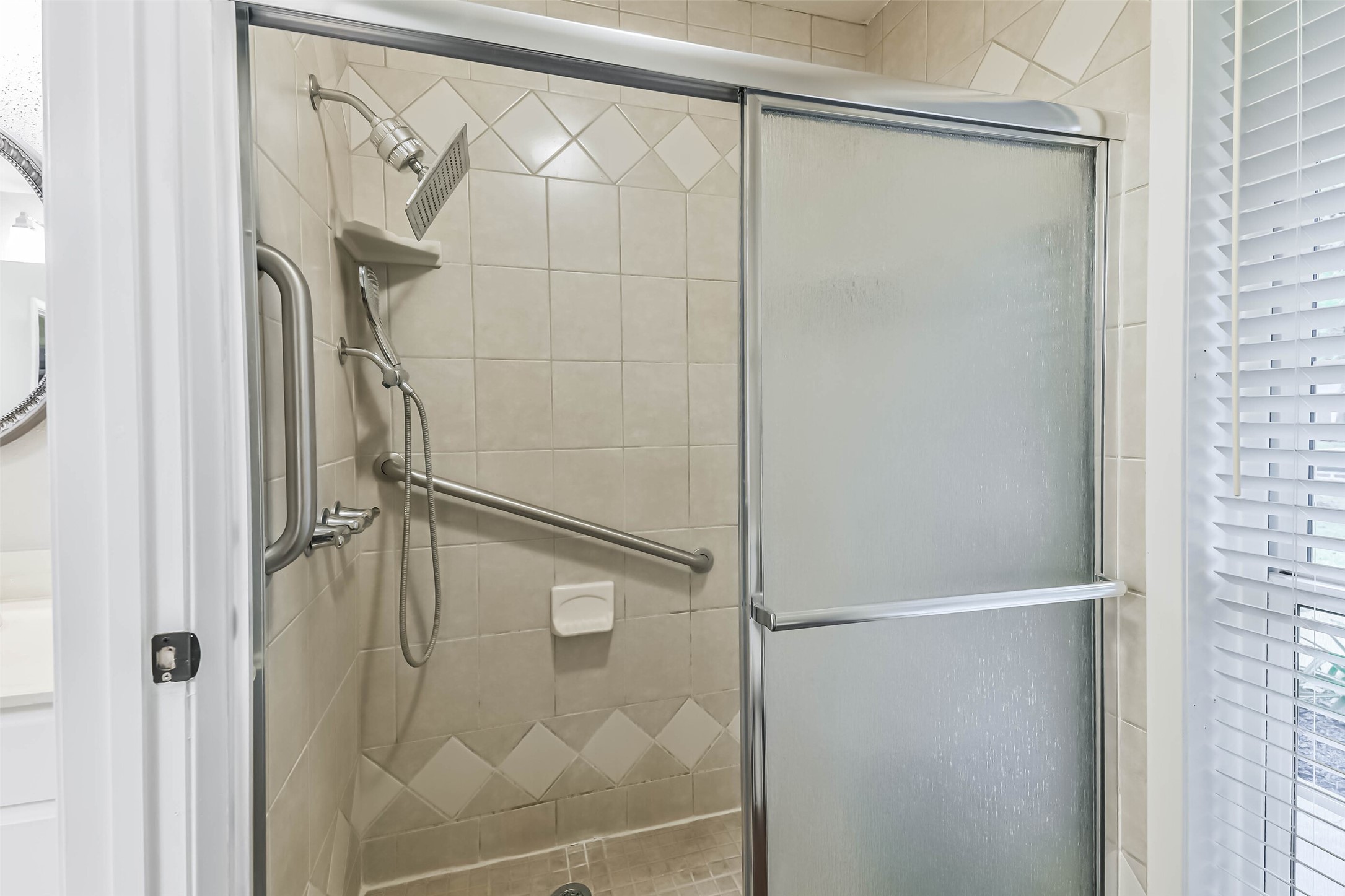 1210 Timber Lane Rosenberg, TX 77471 - Photo 26 of 48 a bathroom with a glass shower door