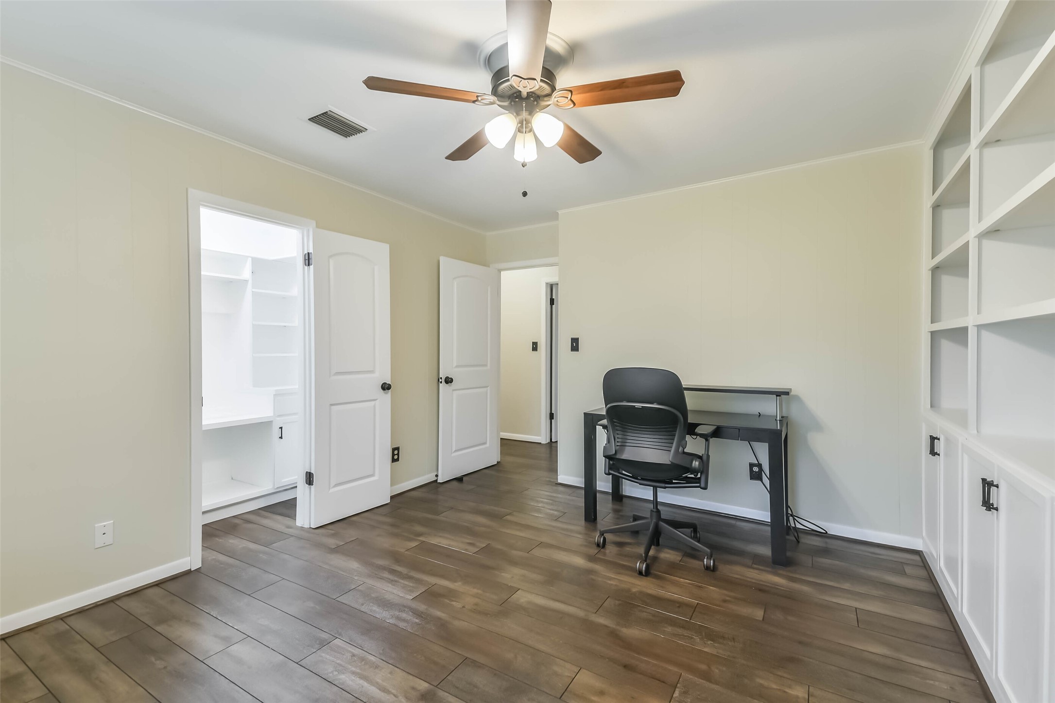 1210 Timber Lane Rosenberg, TX 77471 - Photo 28 of 48 a view of a workspace with furniture and a window