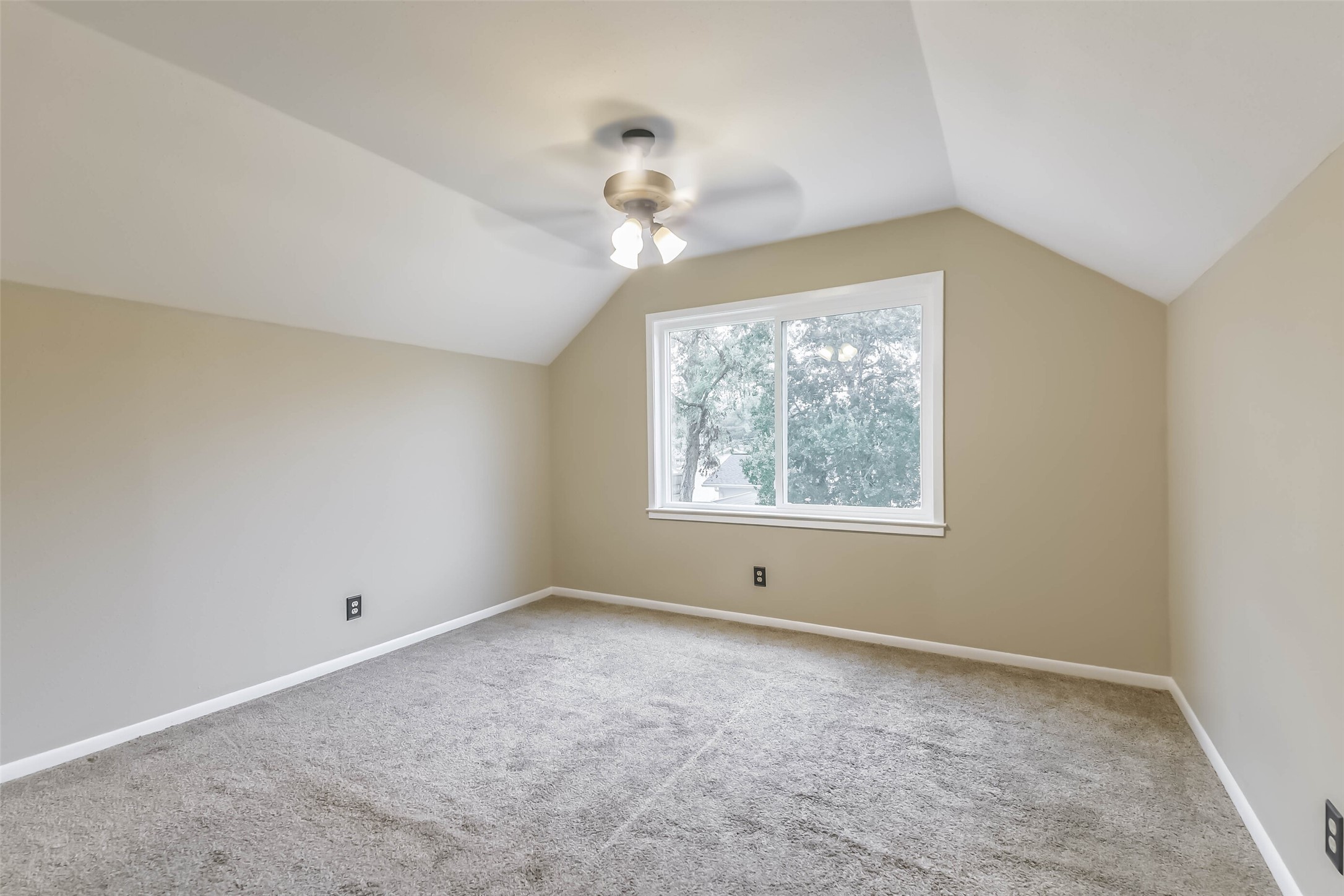 1210 Timber Lane Rosenberg, TX 77471 - Photo 31 of 48 a view of an empty room with a window