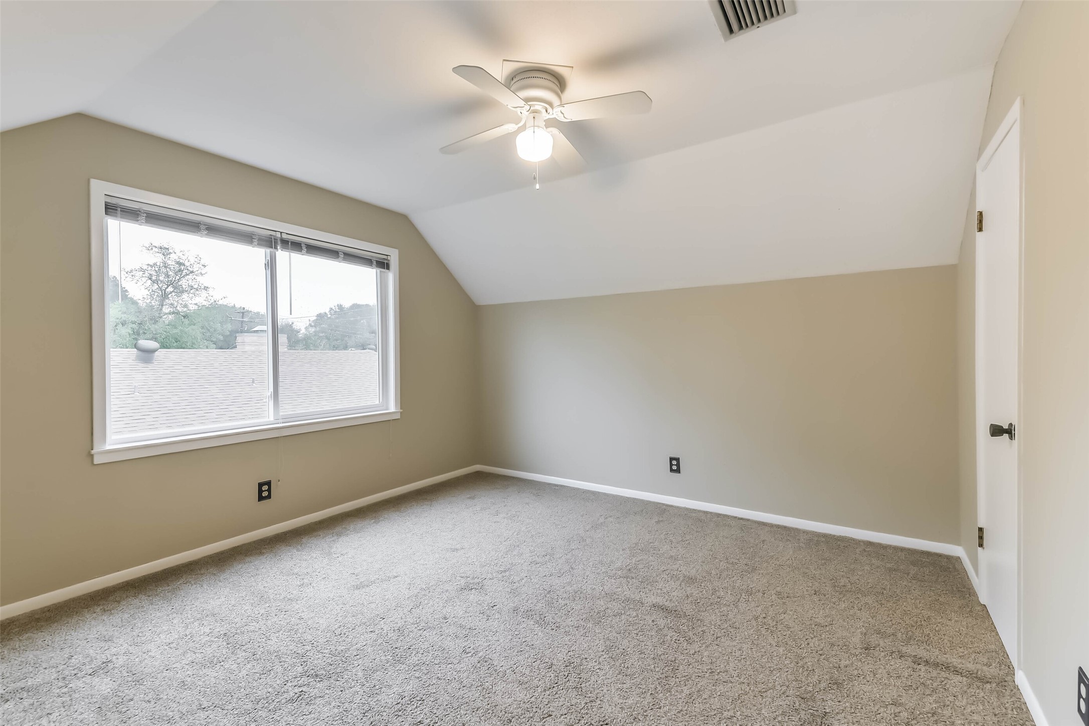 1210 Timber Lane Rosenberg, TX 77471 - Photo 37 of 48 a view of an empty room with a window
