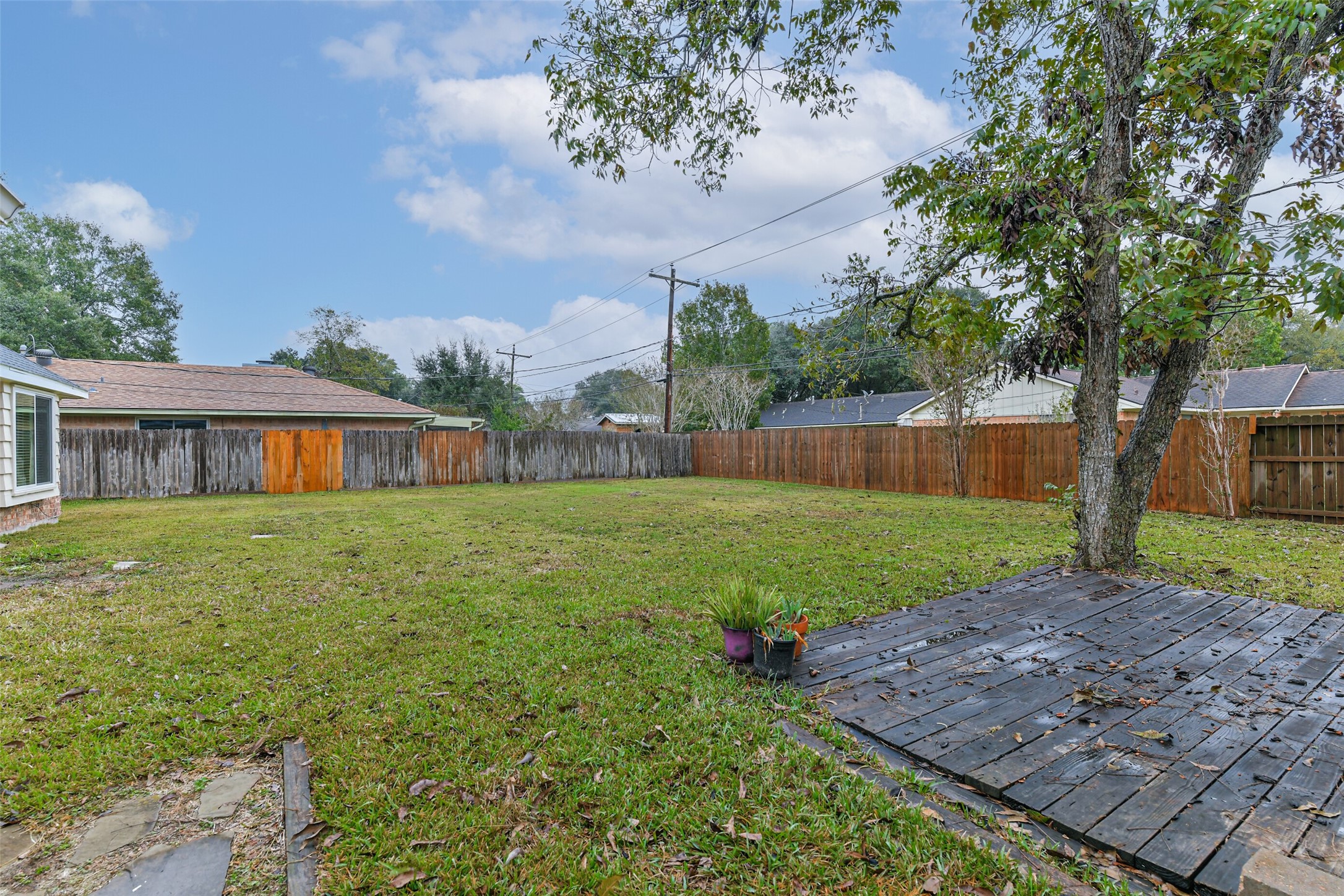 1210 Timber Lane Rosenberg, TX 77471 - Photo 41 of 48 a front view of a house with garden