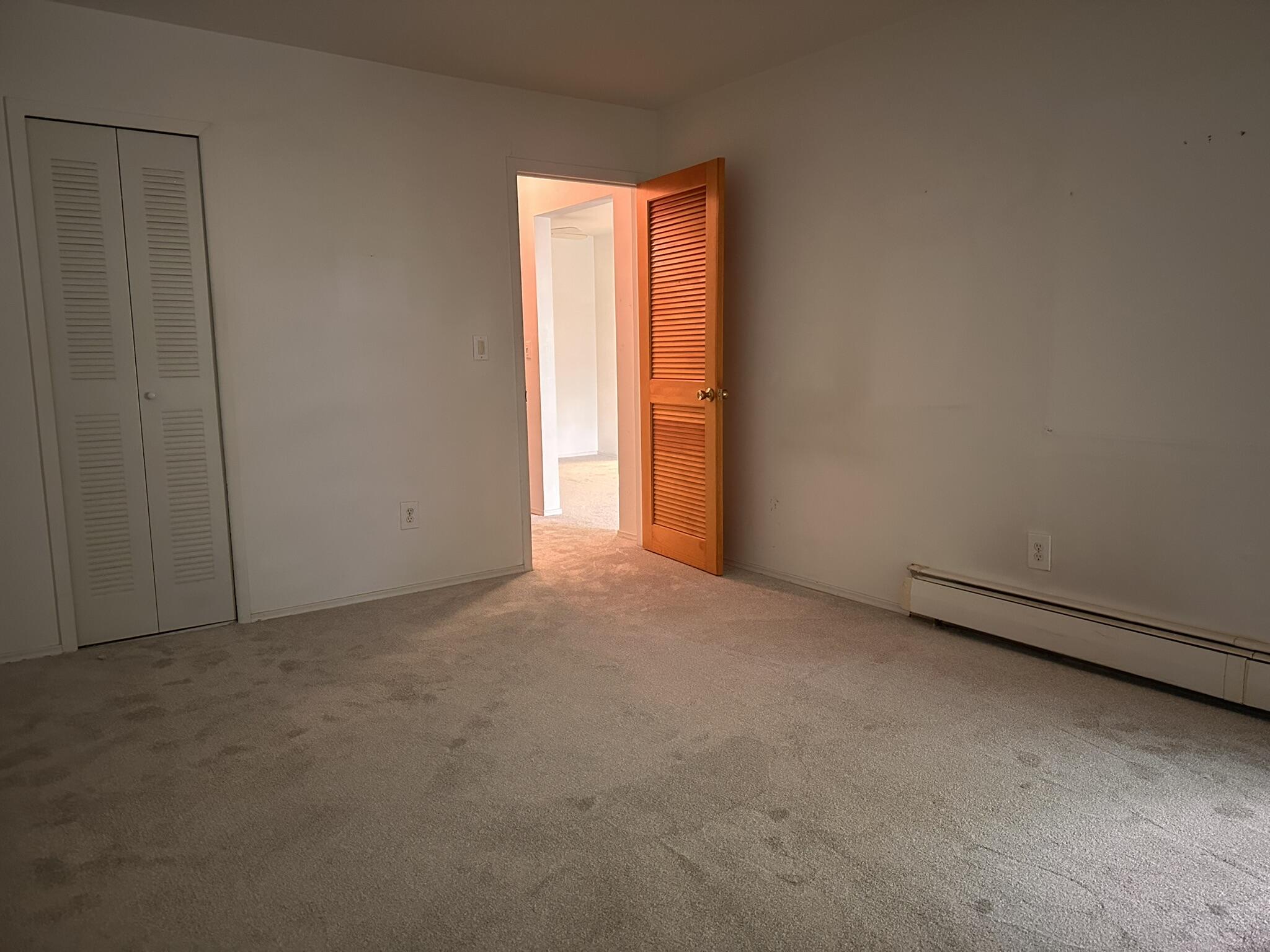 4921 North Crooks Road, Unit N10 Royal Oak, MI 48073 - Photo 13 of 24 BEDROOM DOORWAY AND CLOSET