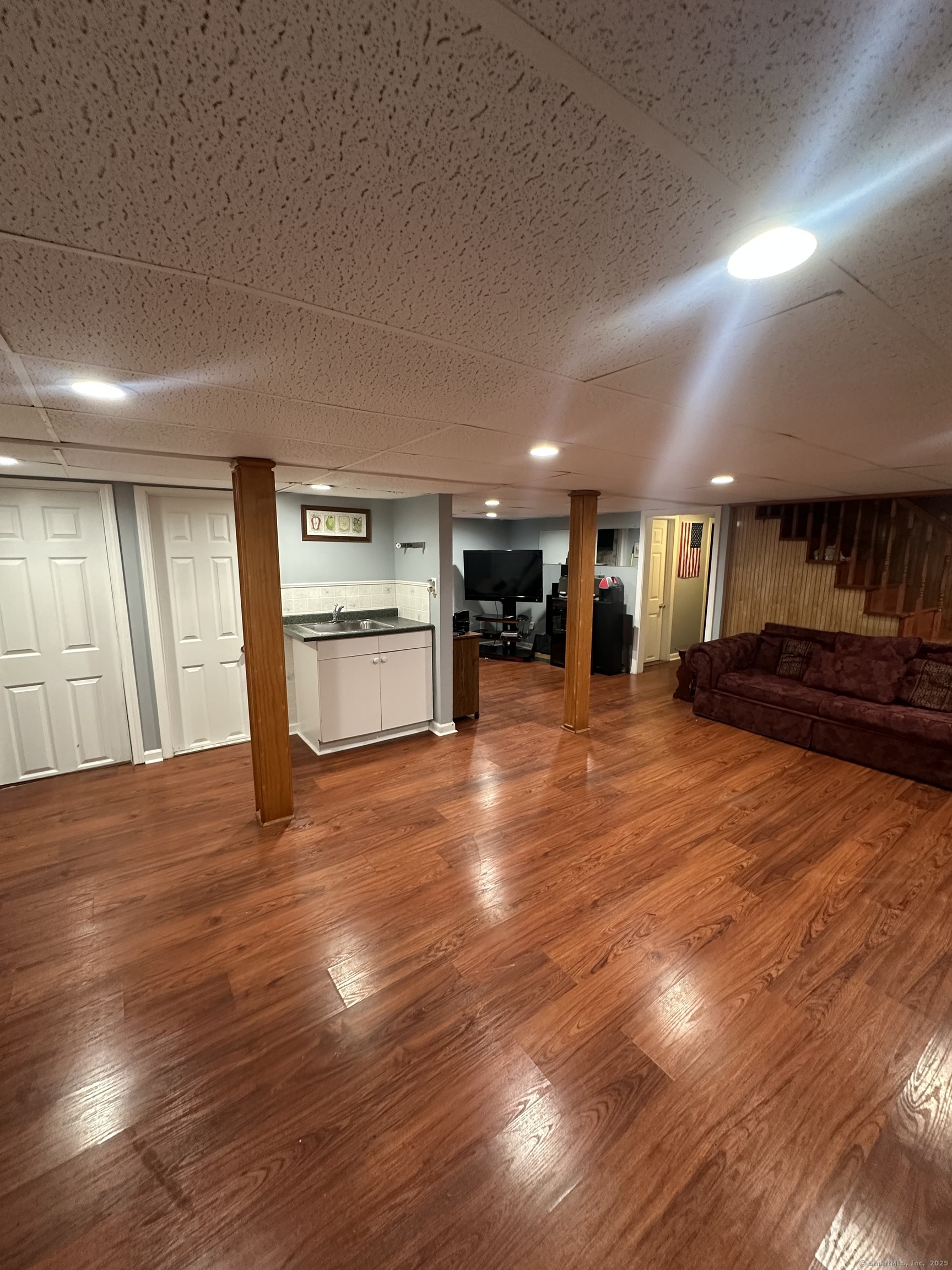 196 Monroe Street Milford, CT 06460 - Photo 20 of 31 a view of a room with lots of wooden furniture
