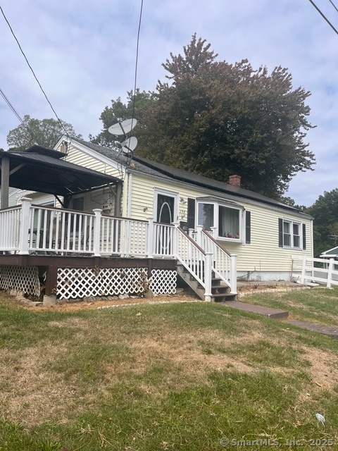 196 Monroe Street Milford, CT 06460 - Photo 2 of 31 a view of a house with a deck