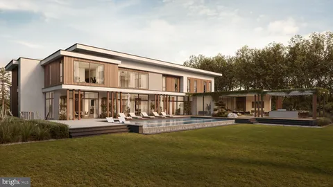 a front view of a building with garden