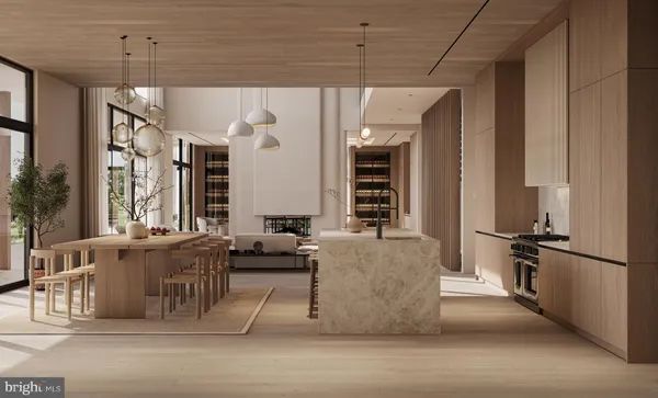 a living room with furniture a large window and stainless steel appliances