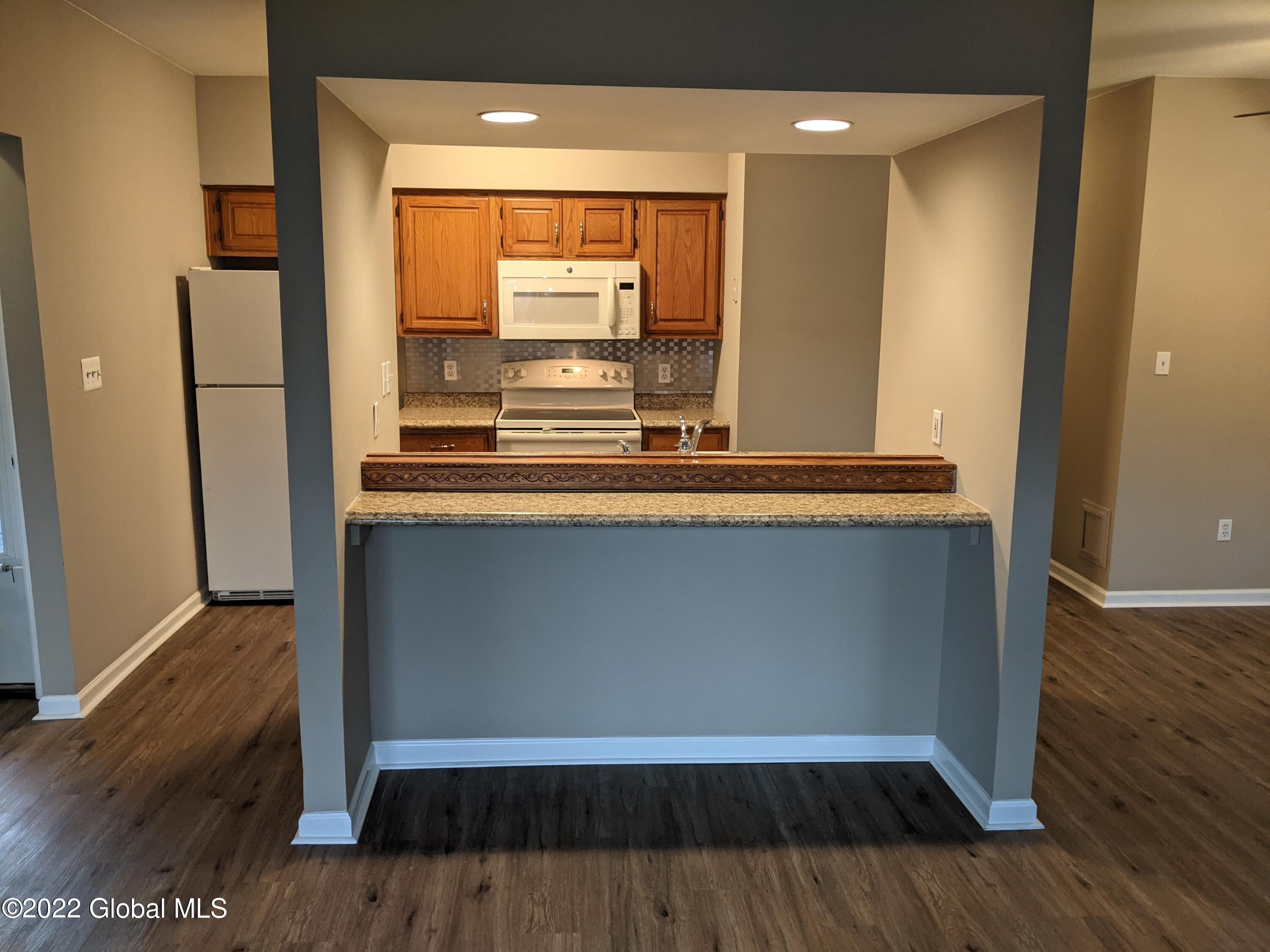 1976 Curry Road, Unit H159 Rotterdam, NY 12303 - Photo 6 of 29 Kitchen view with Eat-In Option