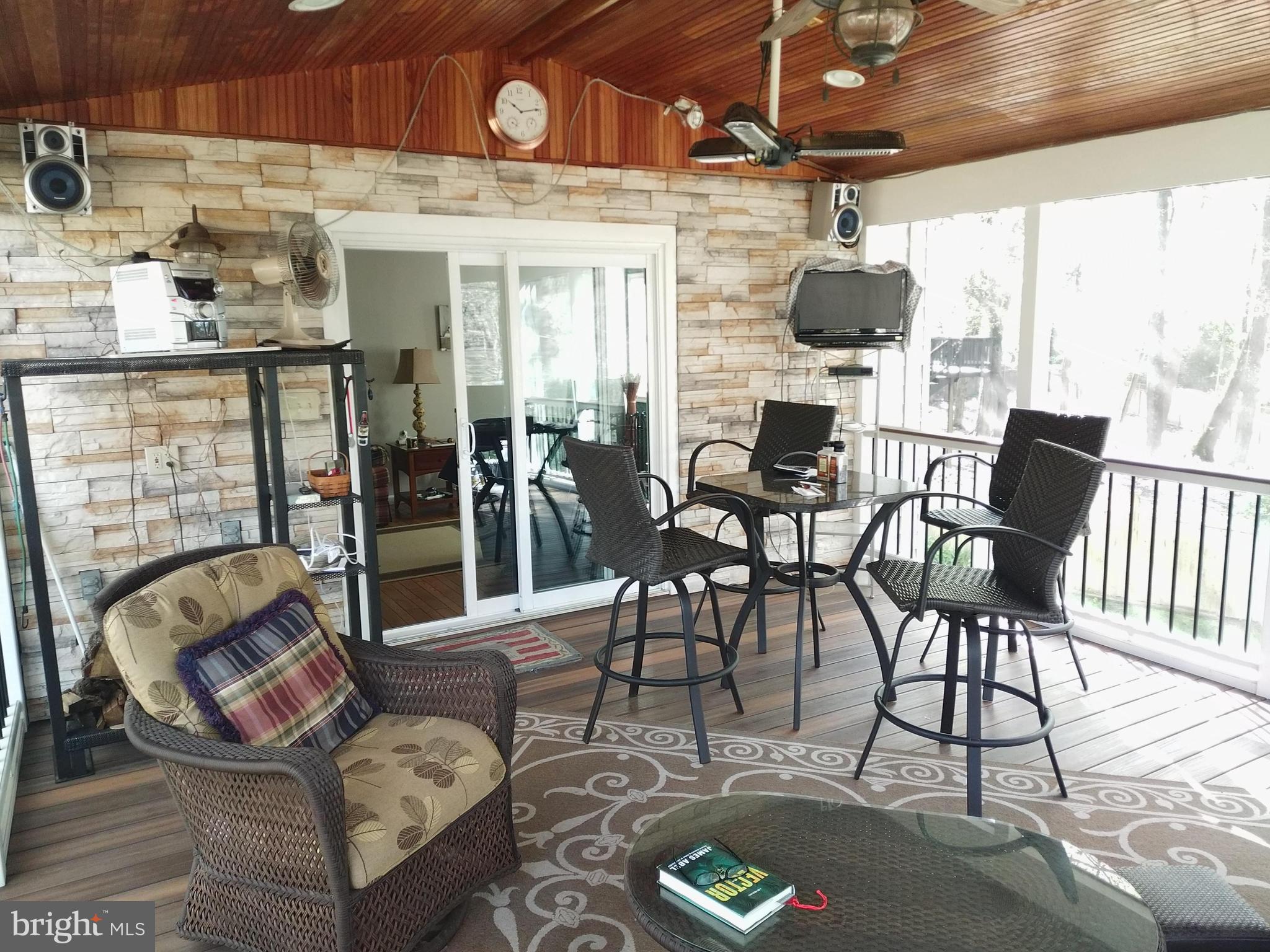 8312 Crown Court Road Alexandria, VA 22308 - Photo 26 of 68 Screened in porch dining area