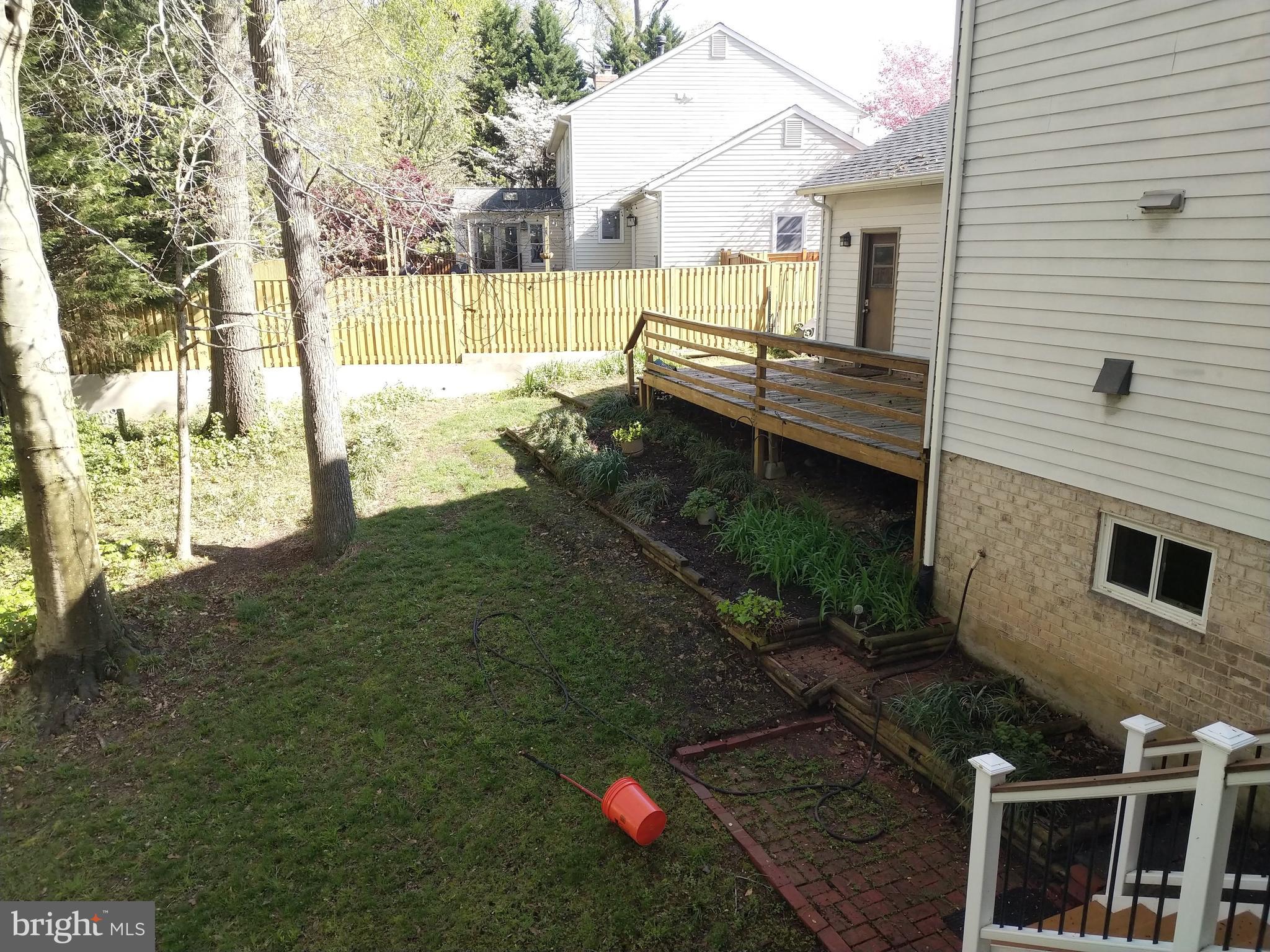 8312 Crown Court Road Alexandria, VA 22308 - Photo 31 of 68 Rear yard and view of second deck off garage