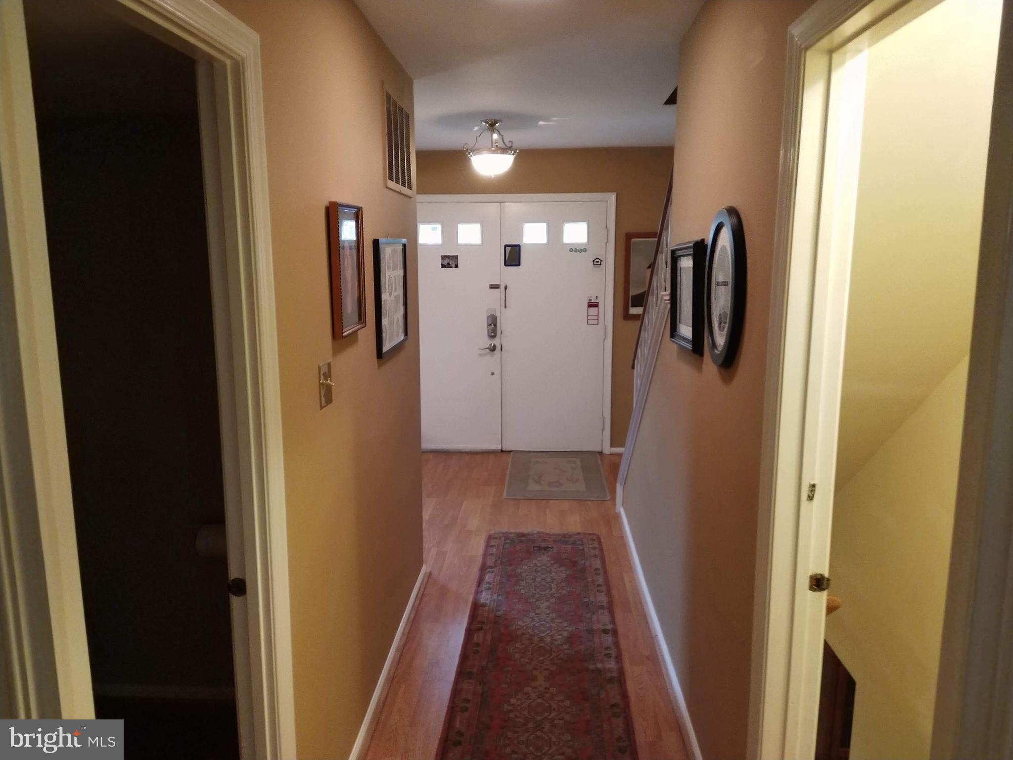 8312 Crown Court Road Alexandria, VA 22308 - Photo 6 of 68 Hall from foyer to family room