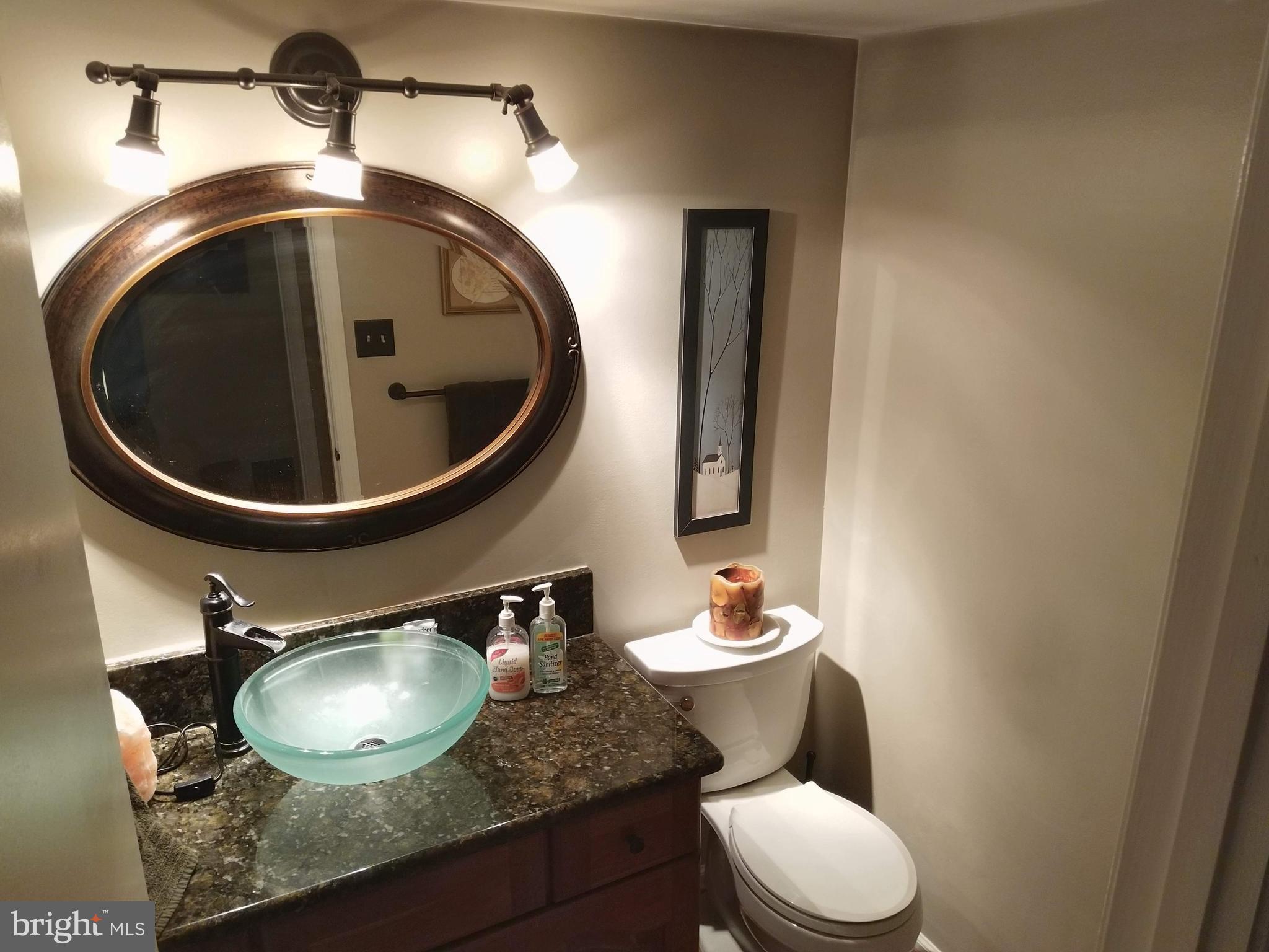 8312 Crown Court Road Alexandria, VA 22308 - Photo 7 of 68 Main level half bath