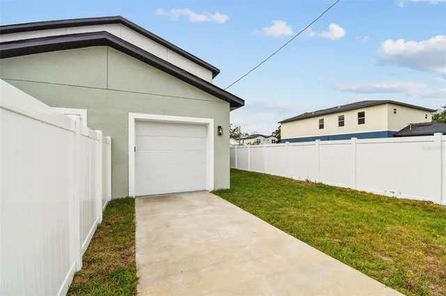 a view of a backyard of a house