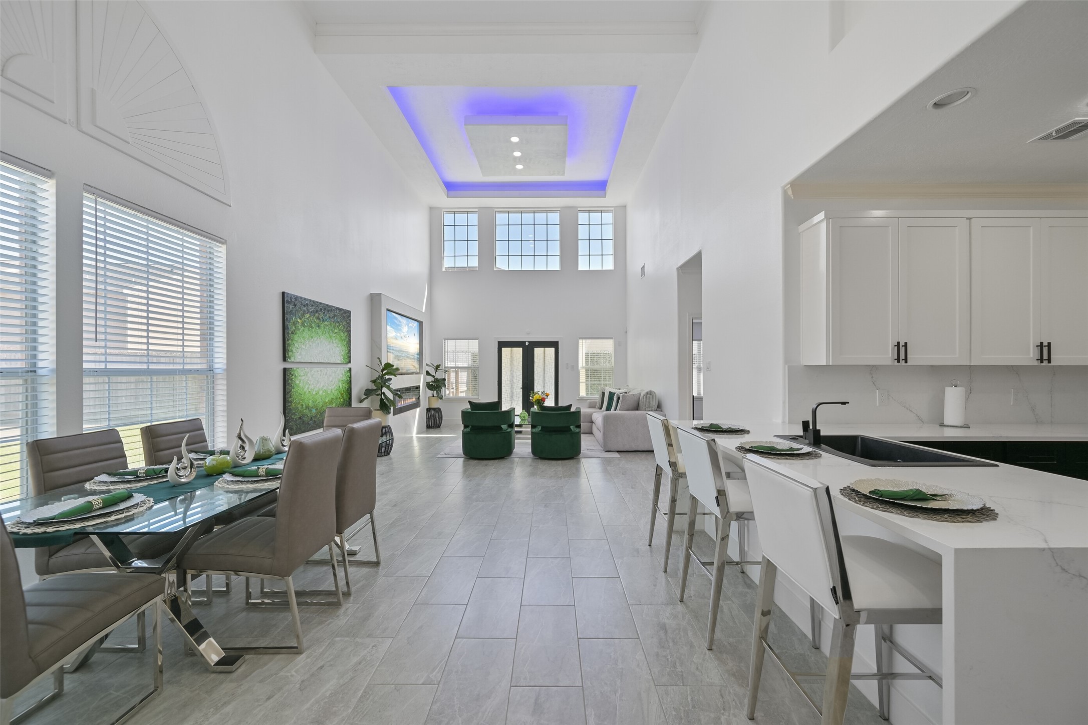 a view of a a dining room with furniture window and wooden floor