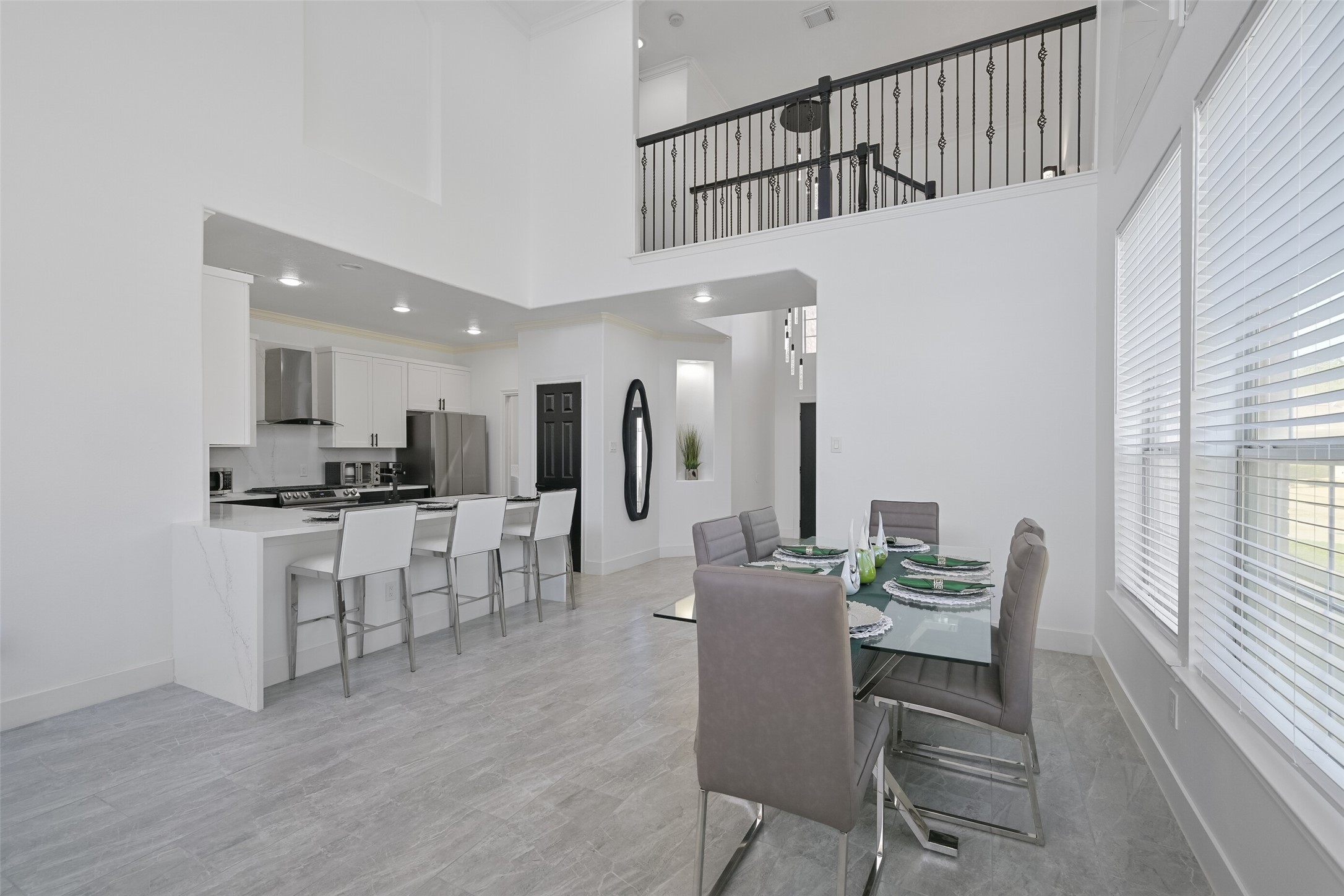 2007 Que Manor Drive Houston, TX 77090 - Photo 11 of 29 a dining room with furniture and a view of kitchen
