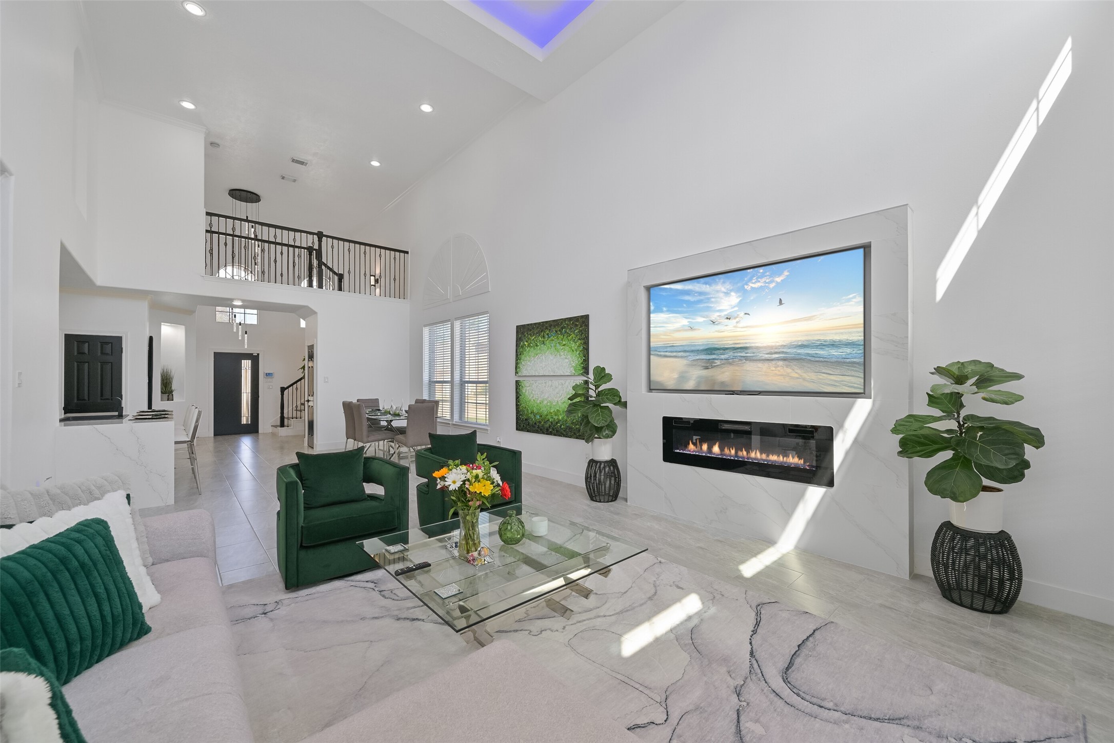 2007 Que Manor Drive Houston, TX 77090 - Photo 15 of 29 a hallway with a couch and a potted plant