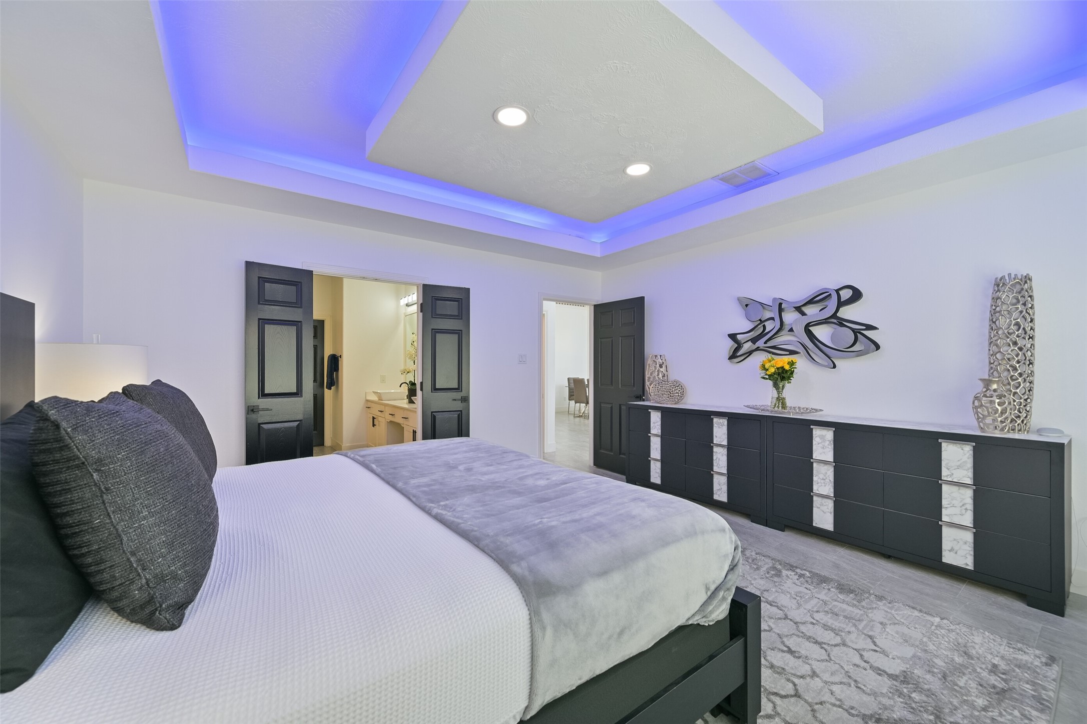 2007 Que Manor Drive Houston, TX 77090 - Photo 19 of 29 a bedroom with a bed and a dresser