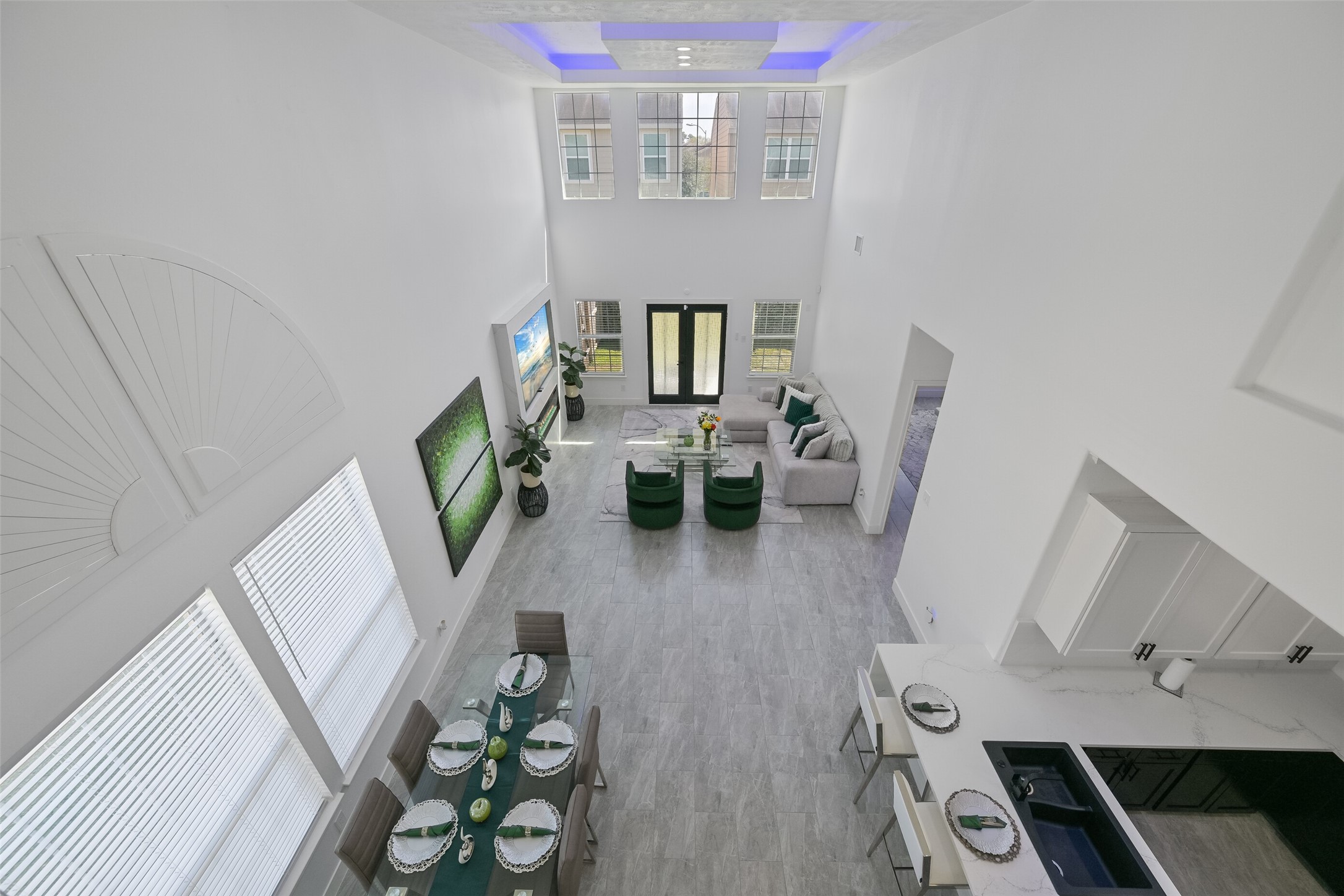 2007 Que Manor Drive Houston, TX 77090 - Photo 23 of 29 a living room with furniture and a chandelier