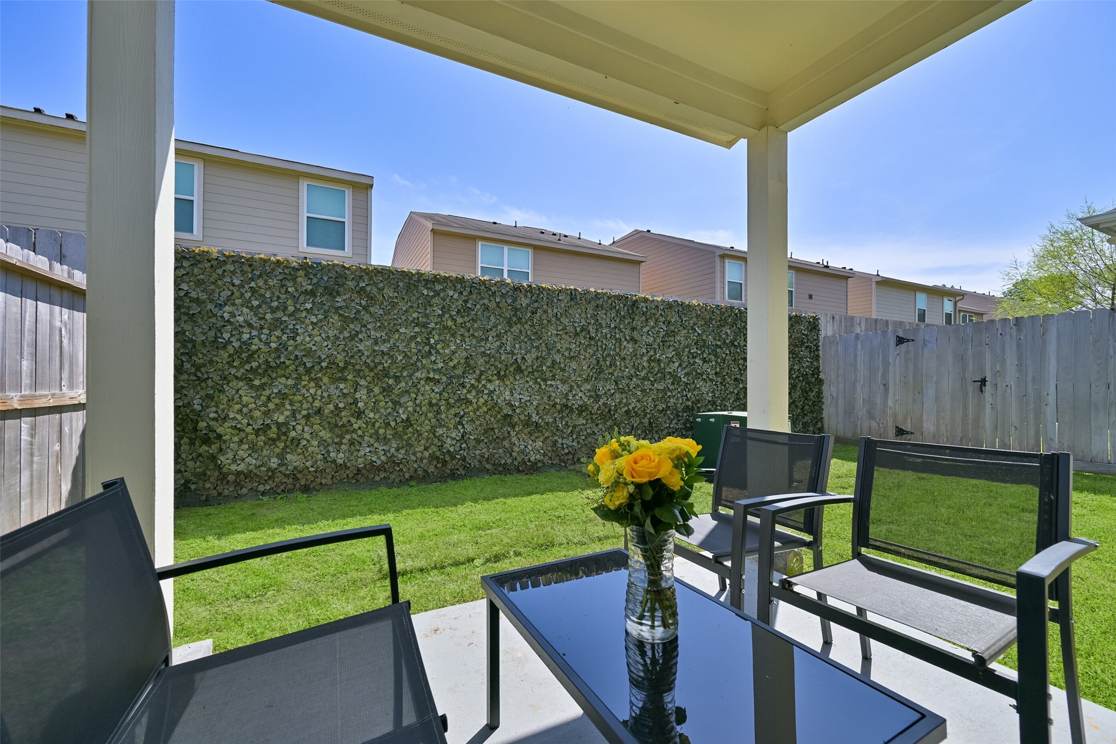 2007 Que Manor Drive Houston, TX 77090 - Photo 27 of 29 a view of a chairs and table in the patio