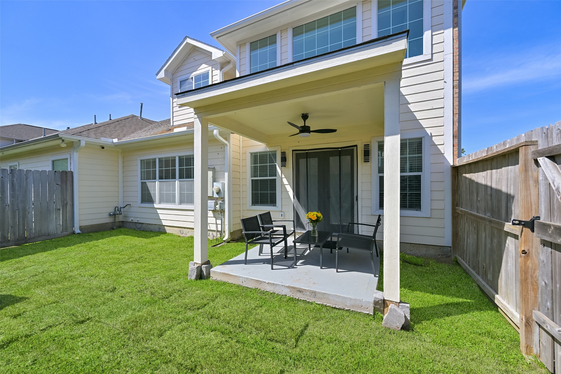 2007 Que Manor Drive Houston, TX 77090 - Photo 28 of 29 a view of an house with backyard porch and furniture