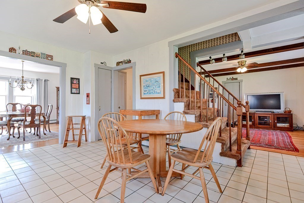 18 1/2 Whitney Street Milford, MA 01757 - Photo 17 of 34 a dining room with furniture and entryway