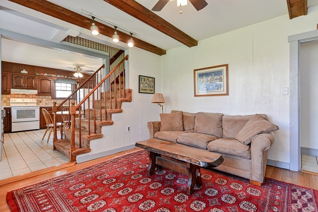 18 1/2 Whitney Street Milford, MA 01757 - Photo 19 of 34 a living room with furniture and wooden floor