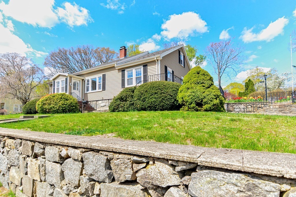 18 1/2 Whitney Street Milford, MA 01757 - Photo 2 of 34 a front view of a house with garden