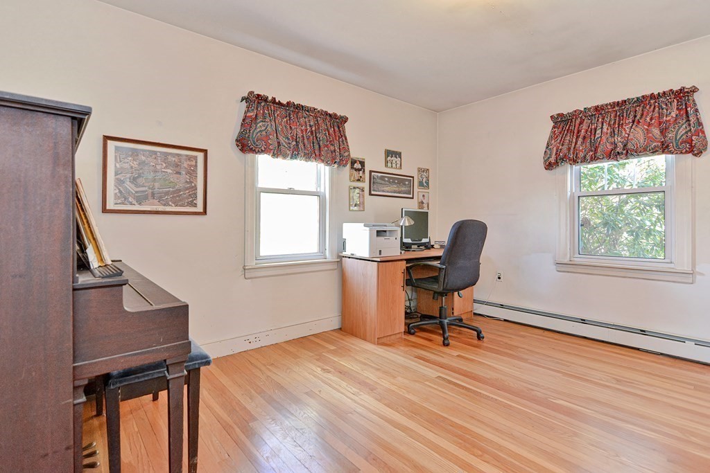 18 1/2 Whitney Street Milford, MA 01757 - Photo 22 of 34 a workspace with furniture and a window