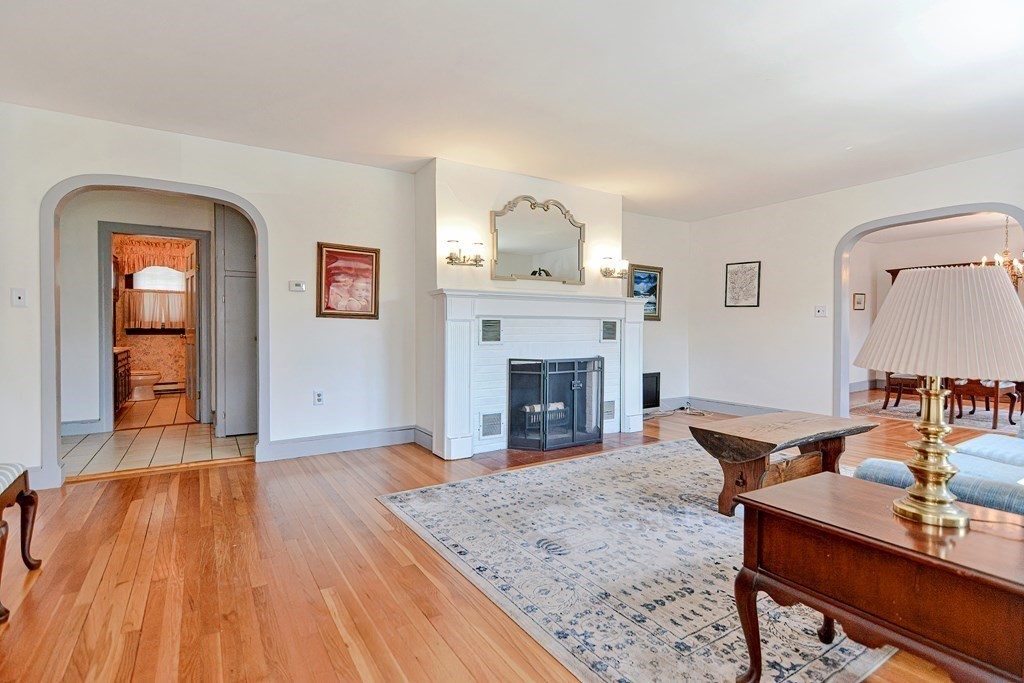 18 1/2 Whitney Street Milford, MA 01757 - Photo 10 of 34 a living room with furniture and wooden floor