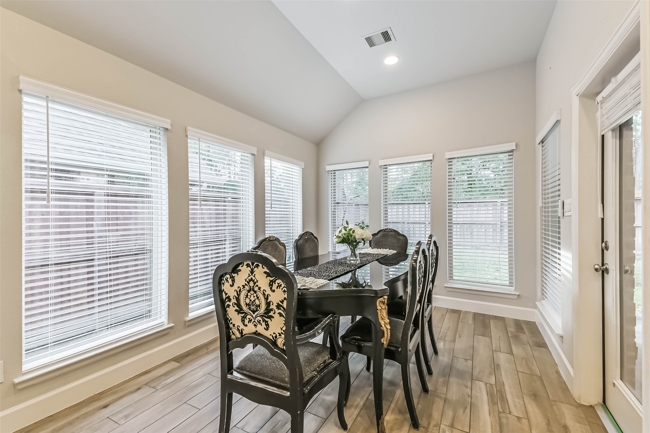 8132 Tyrell Hgts Road Magnolia, TX 77354 - Photo 13 of 40 Dining area with space for a large table, perfect for hosting memorable gatherings.
