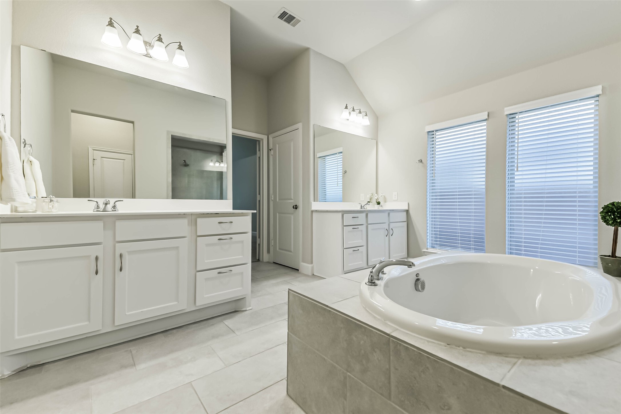 8132 Tyrell Hgts Road Magnolia, TX 77354 - Photo 18 of 40 Dual sinks, prefect fir a serene start if your day.