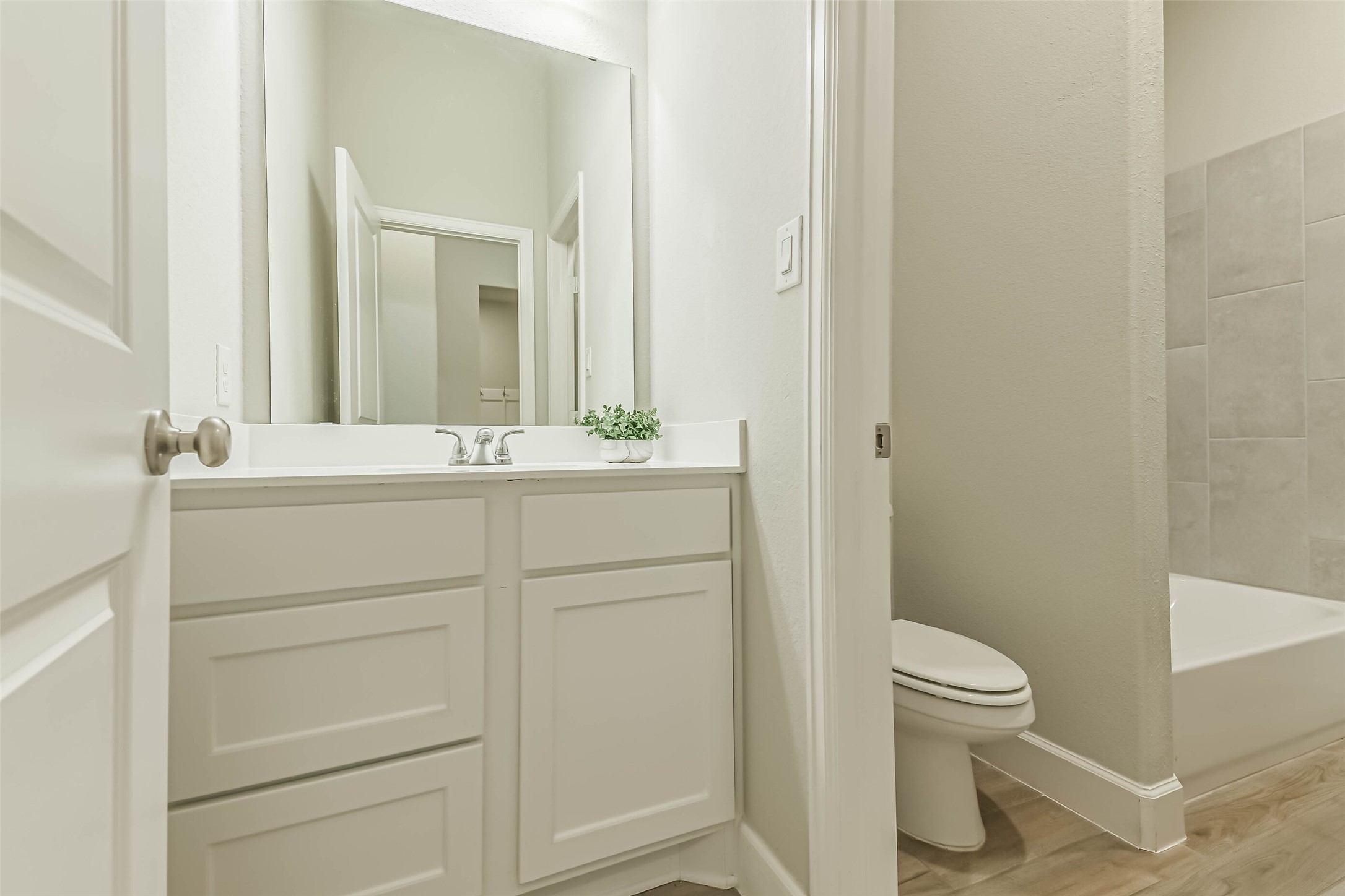 8132 Tyrell Hgts Road Magnolia, TX 77354 - Photo 23 of 40 Jack and Jill bathroom conveniently connecting two of the secondary bedrooms.