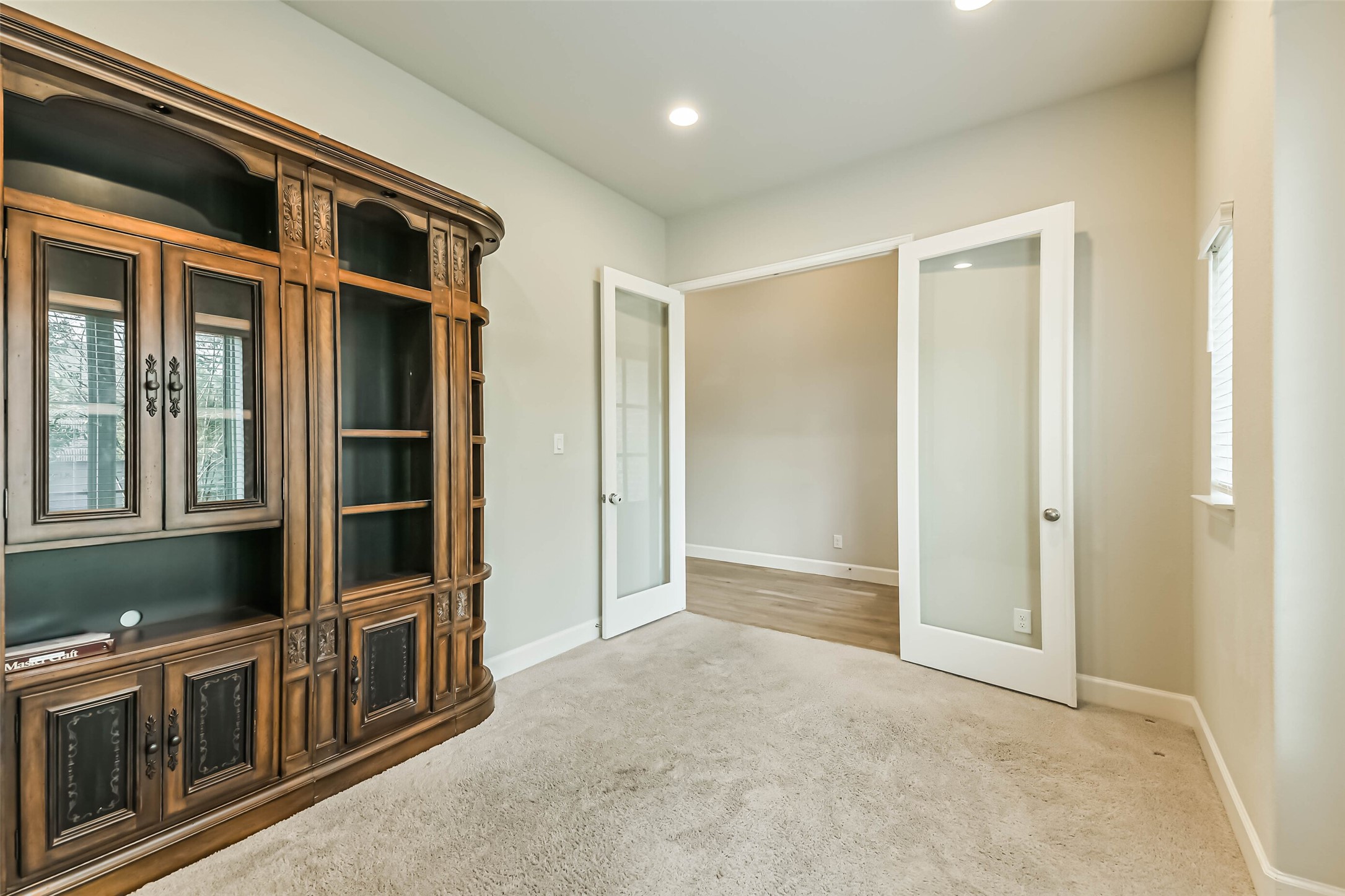 8132 Tyrell Hgts Road Magnolia, TX 77354 - Photo 5 of 40 To the left of the entrance is a spacious office with French doors.