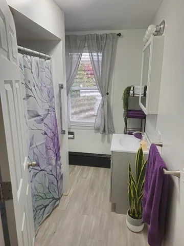 a view of balcony with furniture