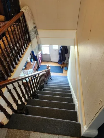 a view of storage and utility room with washer and dryer