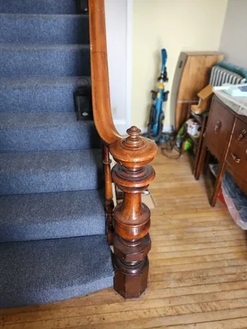 a view of entryway with wooden cabinet