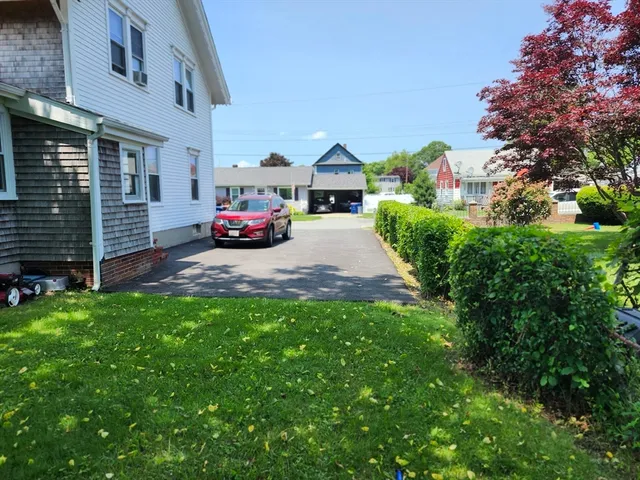 a house view with a garden space
