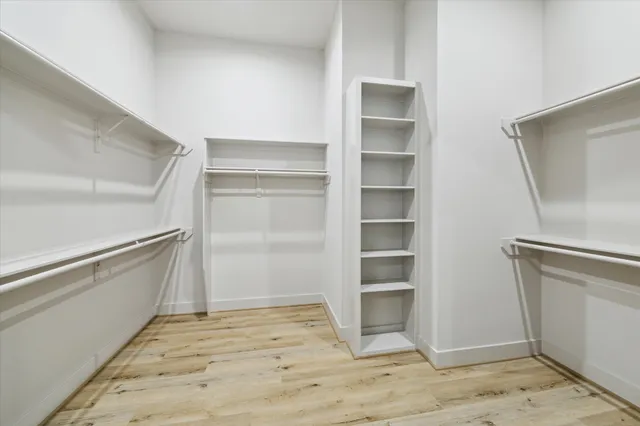 a view of an empty walk in closet