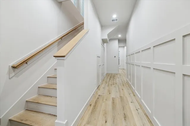 a view of entryway with wooden floor