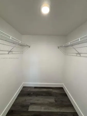 a view of a room with racks on the wall