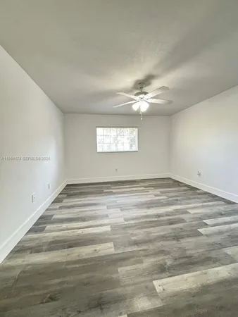 a view of a livingroom with a window