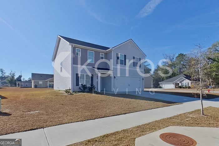 101 St Matthew Way Springfield, GA 31329 - Photo 2 of 30 a front view of house with yard