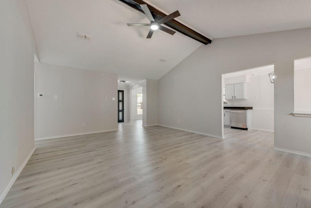 3510 Jonquil Lane Rowlett, TX 75089 - Photo 12 of 35 wooden floor in an empty room with a window