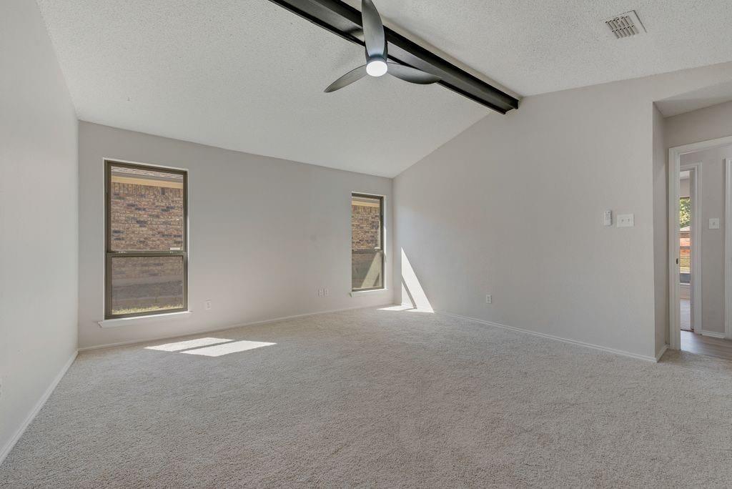 3510 Jonquil Lane Rowlett, TX 75089 - Photo 26 of 35 an empty room with windows