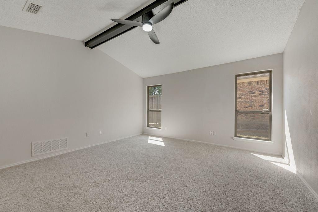 3510 Jonquil Lane Rowlett, TX 75089 - Photo 27 of 35 an empty room with windows and closet