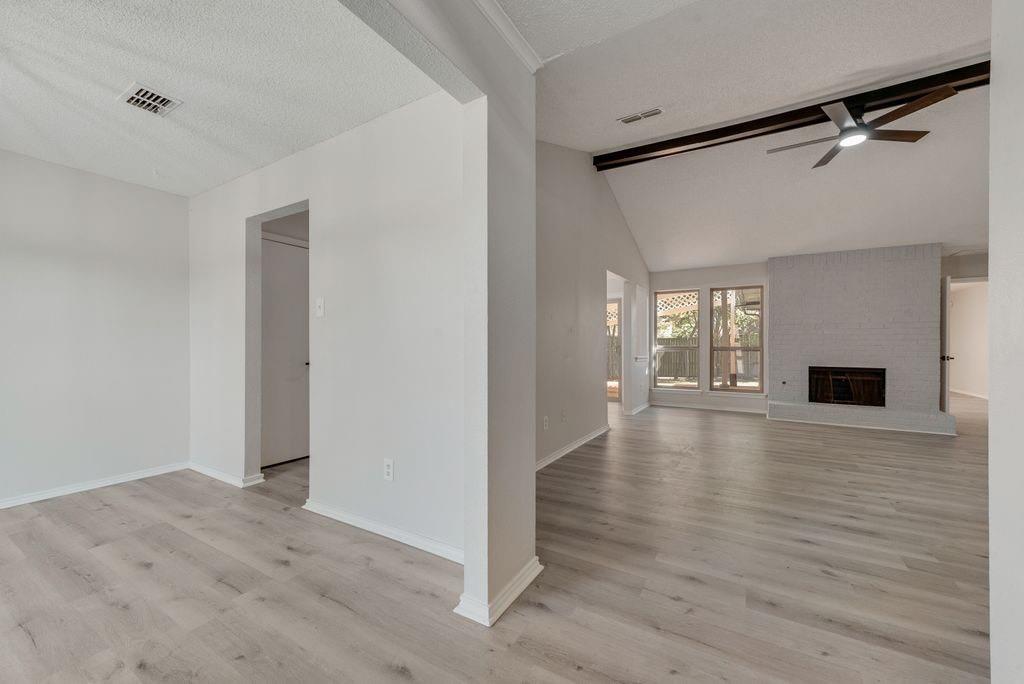 3510 Jonquil Lane Rowlett, TX 75089 - Photo 9 of 35 a view of a livingroom with wooden floor