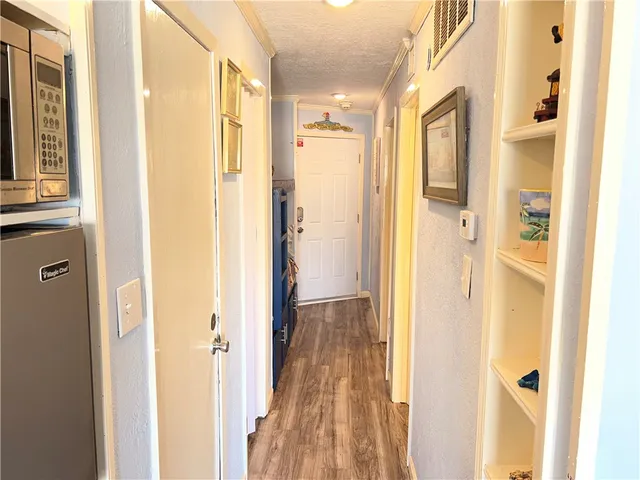 a view of a bathroom with a shower curtain