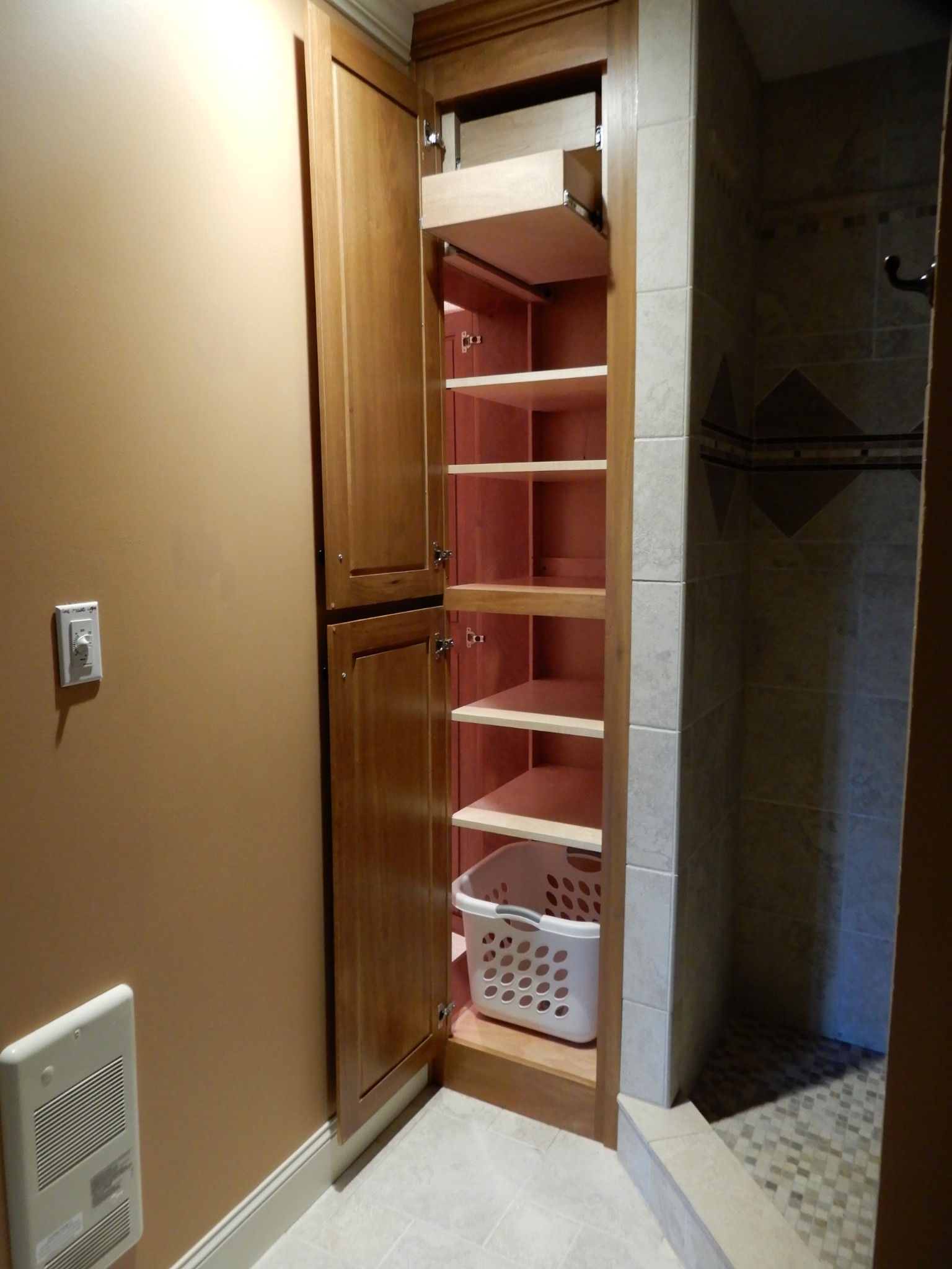 1926 Hunters Run Road Lewisburg, TN 37091 - Photo 16 of 50 Laundry room cabinet as seen from master bath