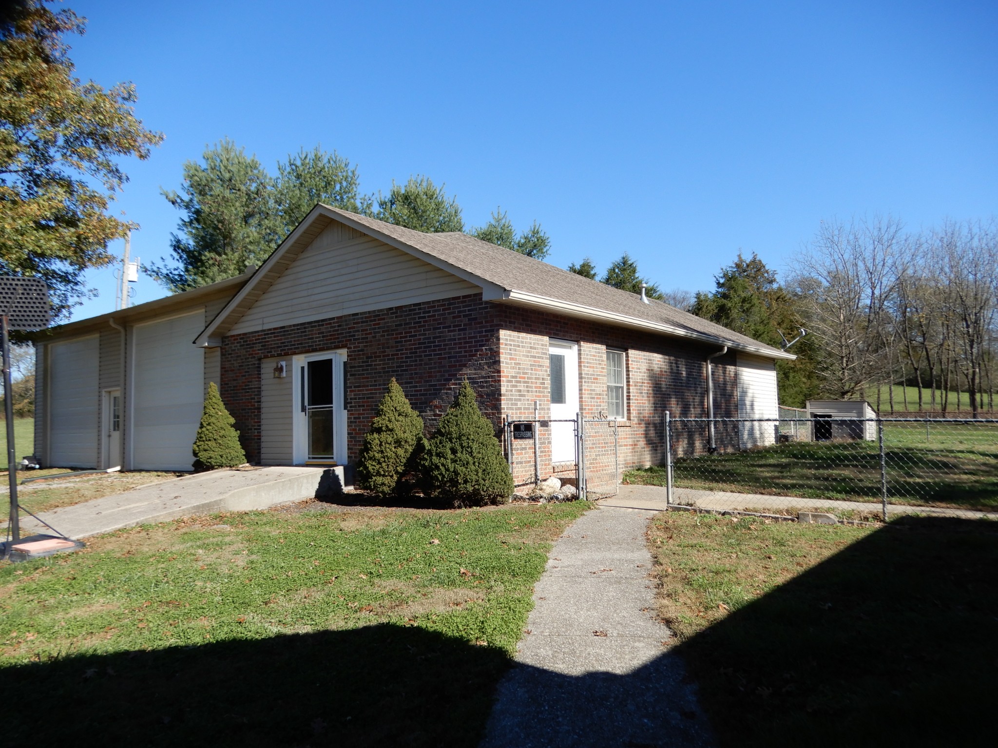 1926 Hunters Run Road Lewisburg, TN 37091 - Photo 47 of 50 Apartment and shop - 2 sidewalks leading from house and rear deck.
