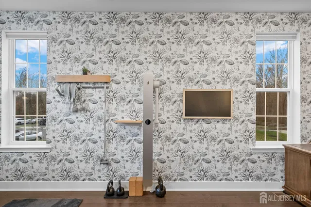 a bathroom with a shower and a sink